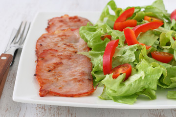 fried pork with salad