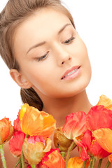 Fototapeta premium lovely woman with red flowers