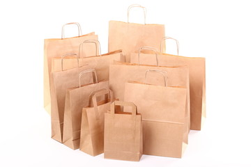 Shopping brown gift bags isolated