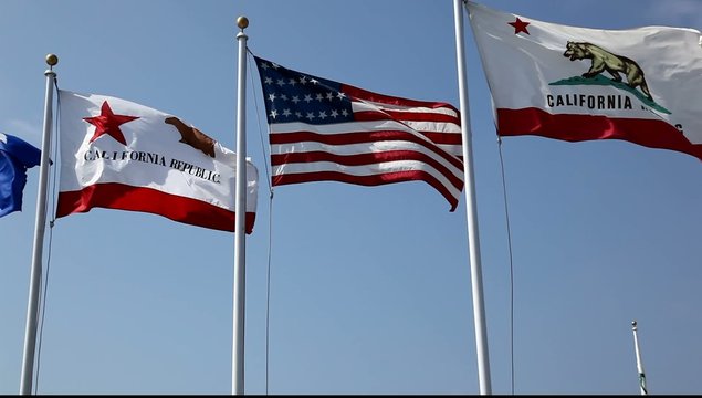American and California flag waving