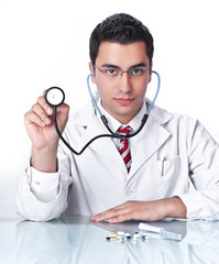 Doctor holding stethoscope,isolated on white background