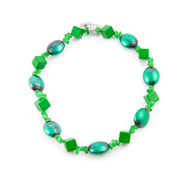 Green isolated beads over white background. Image.