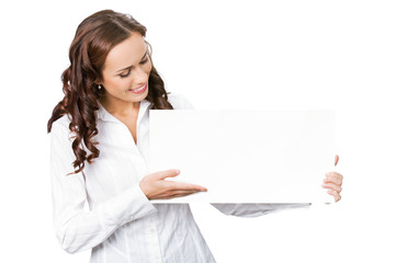 Businesswoman showing blank signboard, on white