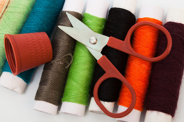 scissors, thimble, thread