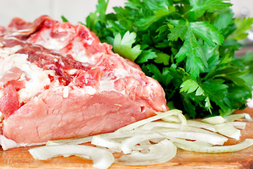 fresh beef on board ready to cook isolated on white