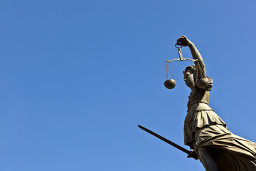 Statue of Lady Justice "Justitia" in front of the Romer in Frank