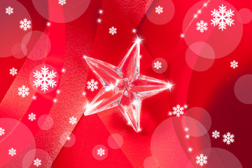 christmas glass star on red ribbon
