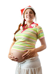 Pregnant woman in santa hat