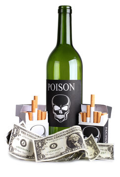 Cigarettes and bottle on money