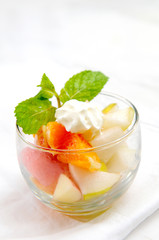 Fresh fruits salad on white background