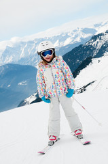 Little skier in Swiss Alps