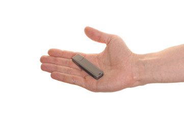 well shaped hand with an USB flash isolated over white
