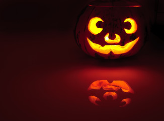 Glowing pumpkin with a candle inside