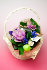 Bridal bouquet in a basket.