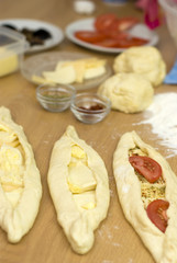 Turkish cooking meals pide from yeast dough cheese and butter