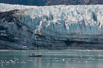 Tiny boat and glacier