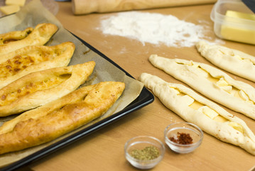 Turkish food pide, yeast dough cheese and butter.