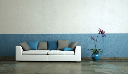 Wohndesign - weisses Sofa vor weissblauer Wand