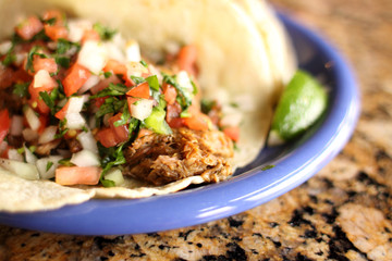 Delicious shredded beef taco at a restaurant.