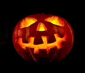 halloween, old jack-o-lantern on black