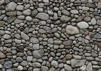 Fond de mur de pierre rond