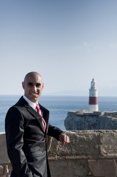 Business Man & Lighthouse