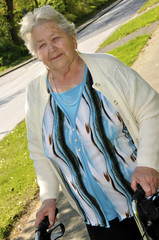 Grandmother outside, with a walking frame