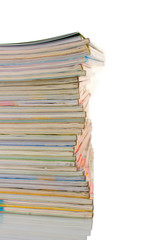 Stack of magazines isolated on white