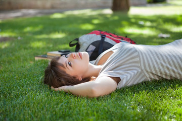 Girl lying down at college campus