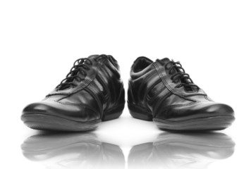 Fashion concept with male shoes on white