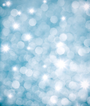 Abstract blue background or glittering lights