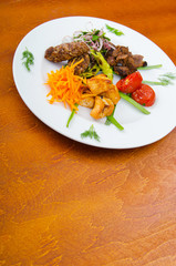 Plate with tasty lamp kebabs