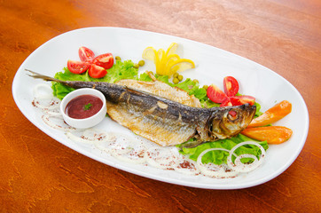 Fried fish in the plate