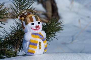 happy snowman on a fir tree background