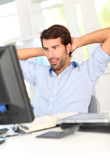 Relaxed businessman in office