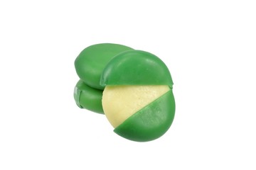 Selection of green mini baby cheese balls in wax