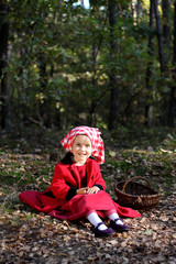 Autumn girl in a red scarf