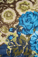 blue rose and green floral fabric