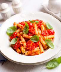 Sedani rigati with cherry tomatoes and basil