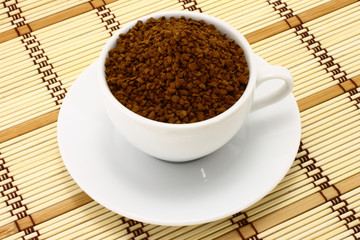 Cup of ground coffee