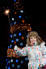 Magic Christmas light  - little girl with firework