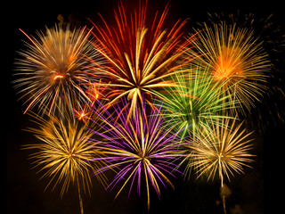 Fototapeta na wymiar Cluster of vibrant fireworks