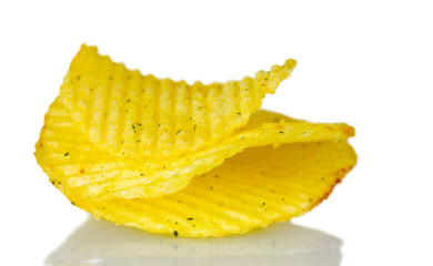 Delicious potato chips isolated on white