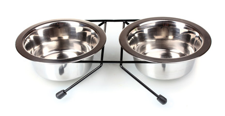 Empty bowls to animal food isolated on white