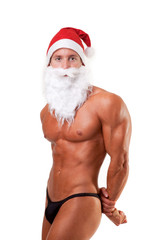 bodybuilder santa claus posing over white