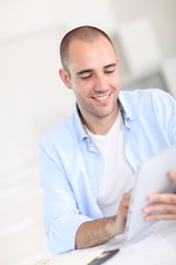 Fototapeta premium Office worker using electronic tablet