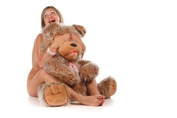 Cheerful woman with teddy bear