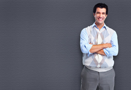 Smiling Man Over Grey Canvas Background