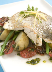 Grilled cob seafood on bed of vegetables