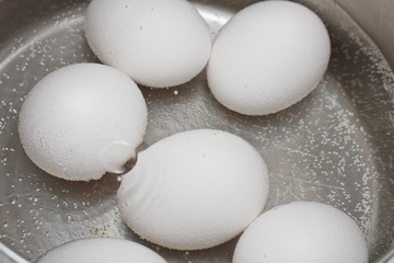 Eggs Boiling in a Pot